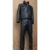 Elvis Presley is wearing black leather suit